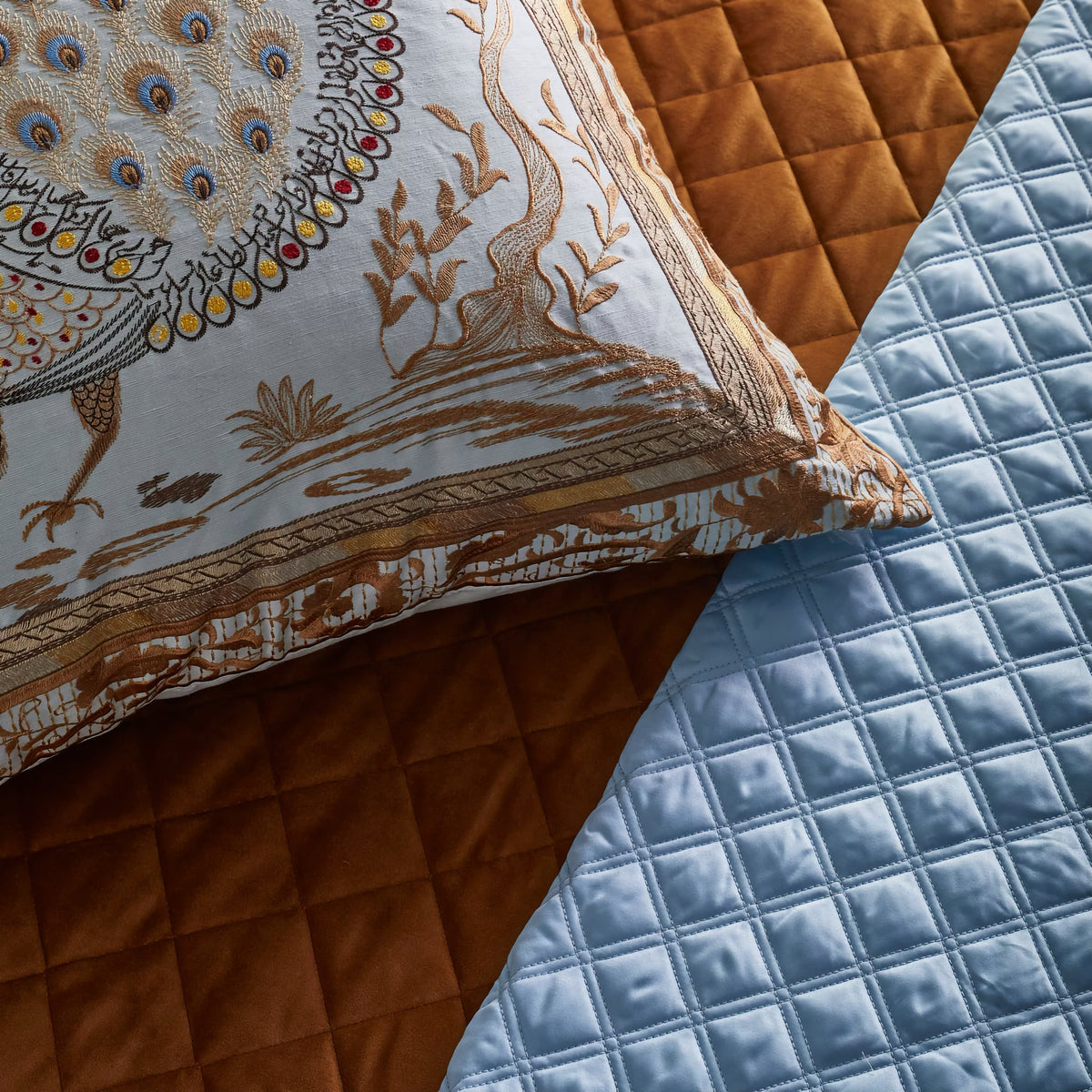 Finishing Detail of The Met x Ann Gish Divani Peacock Decorative Pillow in Aqua/Gold