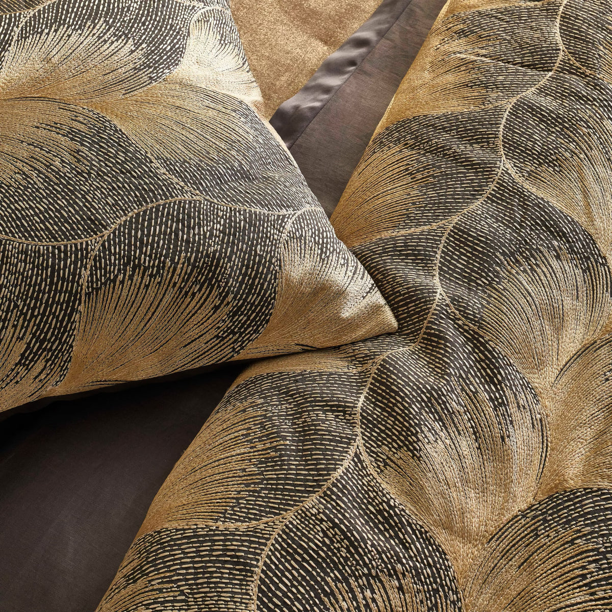 Detail View of The Met x Ann Gish Fan Duvet Cover and Decorative Pillow in Umber and Gold
