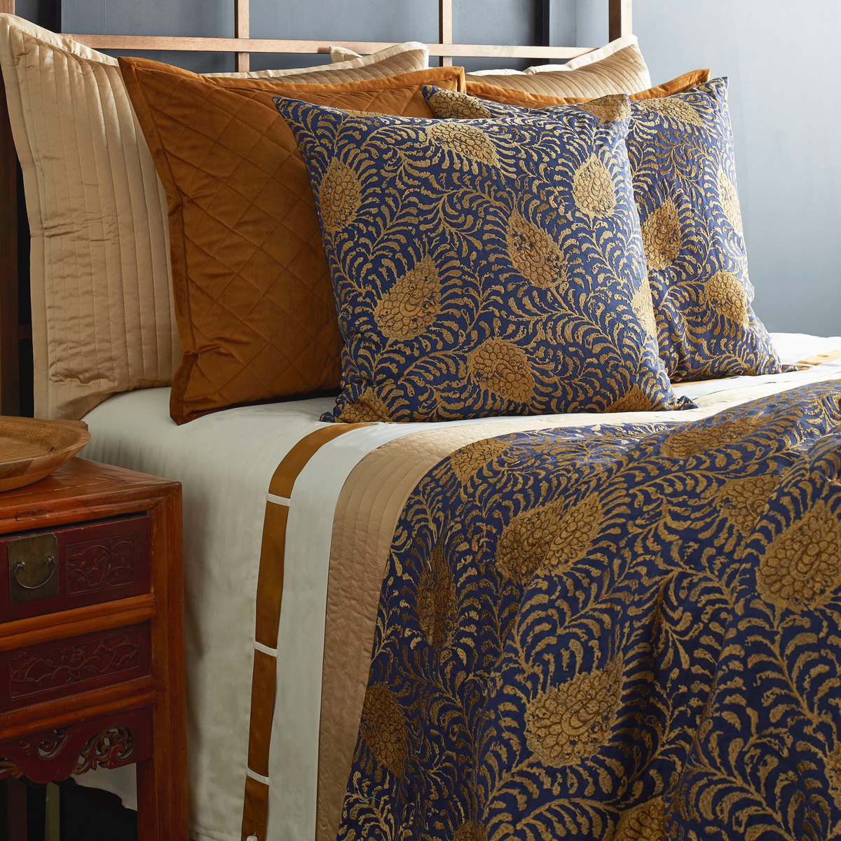 Closeup of The Met x Ann Gish Kinrande Duvet Cover and Sham in Marine and Gold