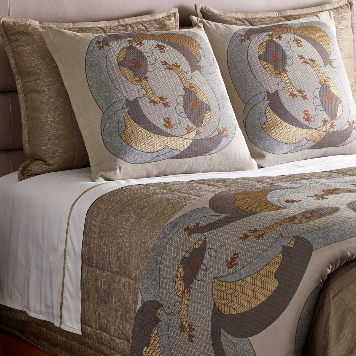 Closeup of The Met x Ann Gish Kosode Throw and Decorative Pillow in Blue and Gold