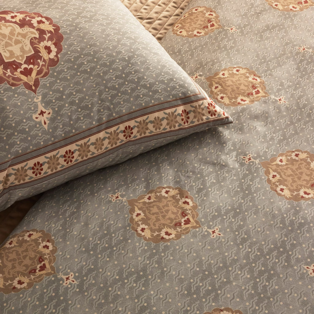 Closeup of The Met x Ann Gish Medallion Comforter Set