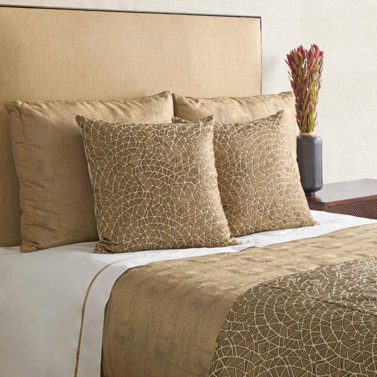 Closeup of The Met x Ann Gish Ornament Duvet Cover and Decorative Pillow in Gold and Charcoal
