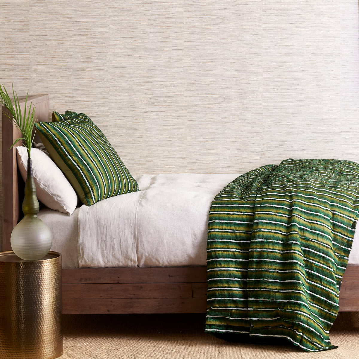 Side View of The Met x Ann Gish Pluma Duvet Cover and Decorative Pillow in Green