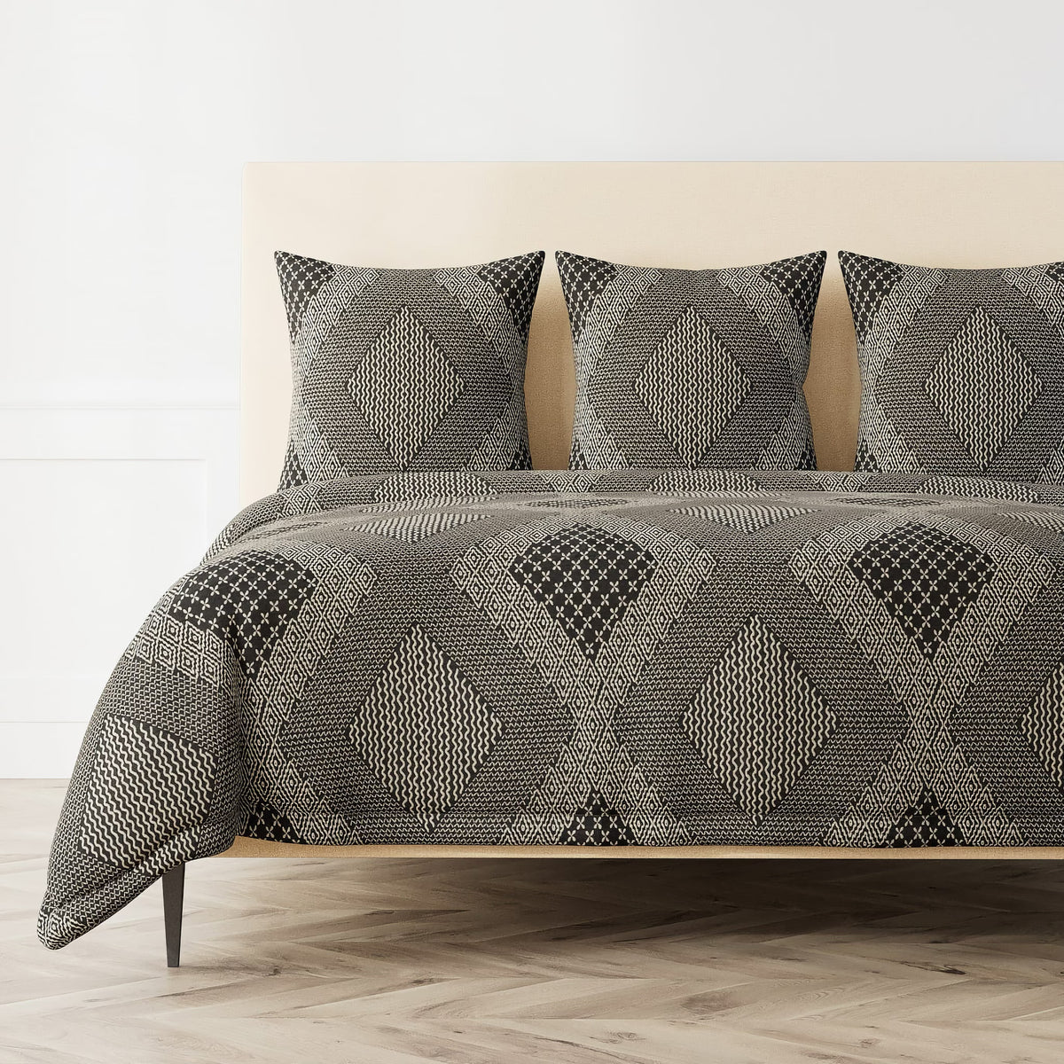 The Met x Ann Gish Sashiko Hishi-Moyo Duvet Cover and Decorative Pillows in Charcoal