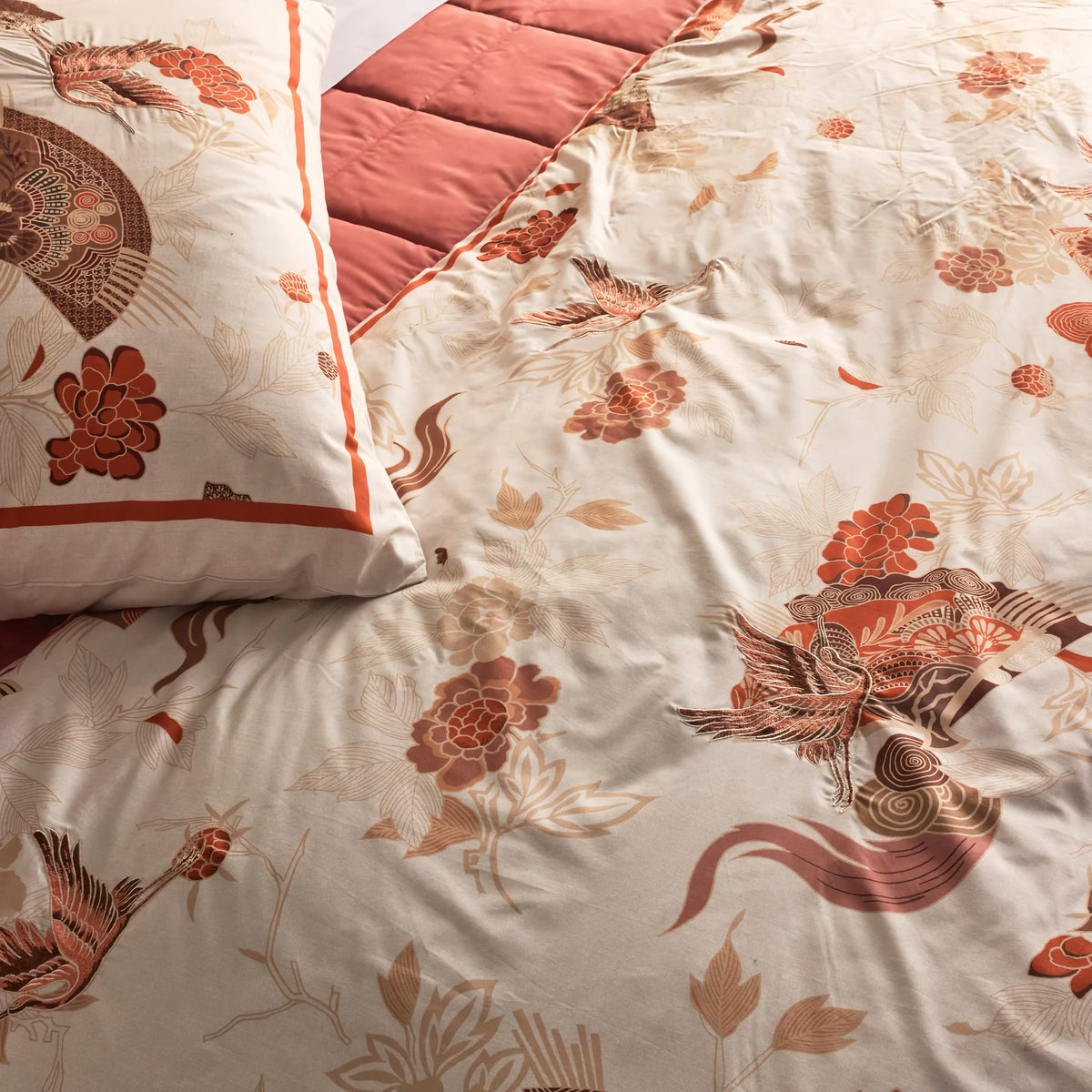 Detailed view of Peach-colored The Met x Ann Gish Sensu Comforter Set