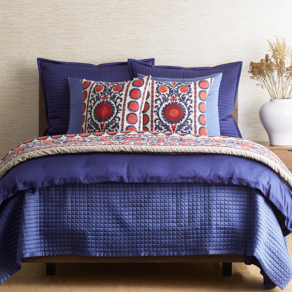 The Met x Ann Gish Suzani Throw and Decorative Pillow in Indigo with Coordinate Bedding
