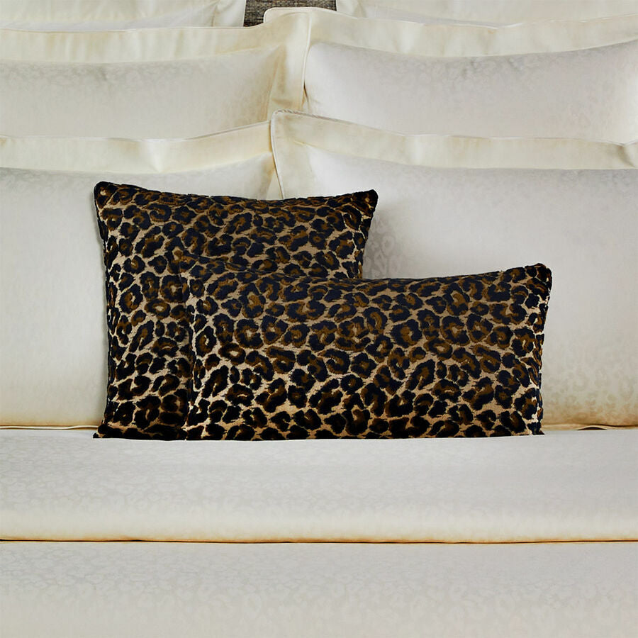 Yves Delorme Leopard Decorative Pillows on bed with YDL Leopard Bedding