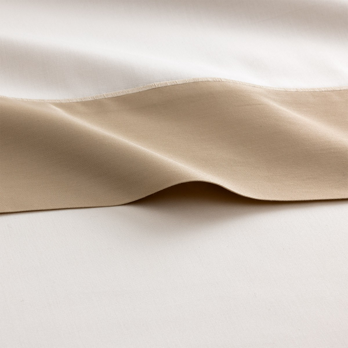 Close-up of Yves Delorme Apollon Bedding Fabric in Dune Color