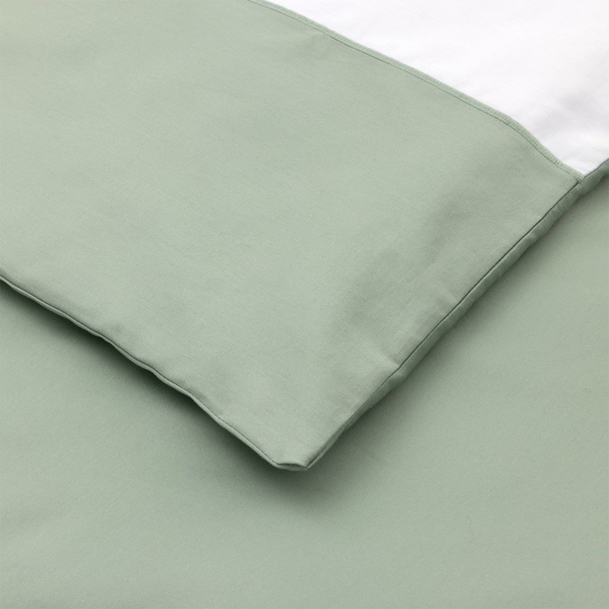 Close-up of Yves Delorme Apollon Bedding Fabric in Veronese Color