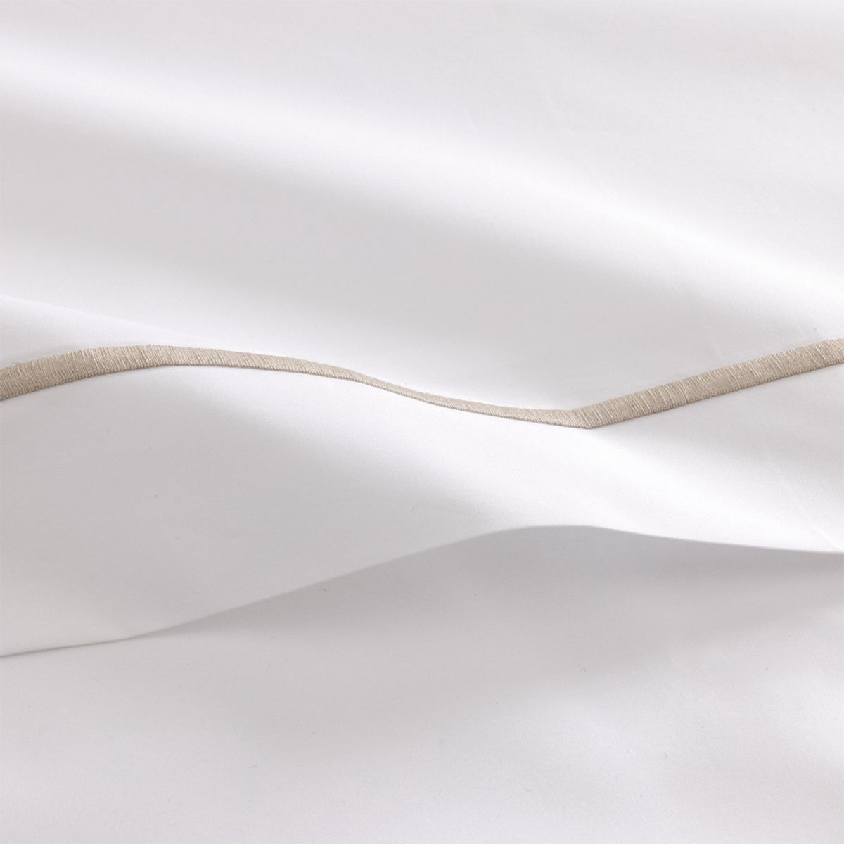 Fabric Closeup of Yves Delorme Athena Bedding and Loutre embroidery