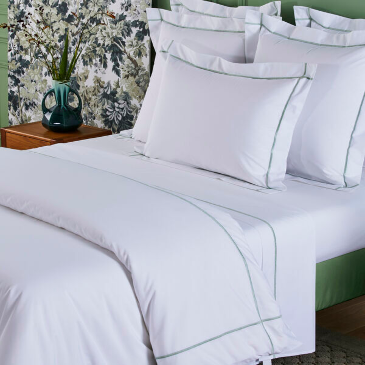 Side View of a Full Bed Dressed in Yves Delorme Athena Bedding in Veronese Color
