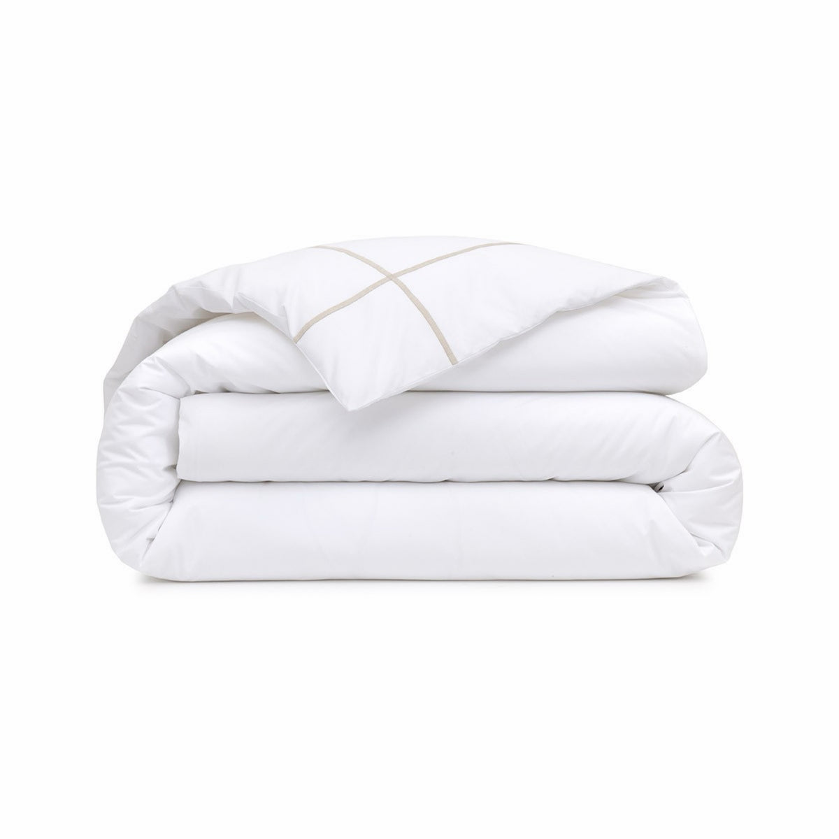 A neatly folded Duvet Cover of Yves Delorme Athena Bedding with Loutre embroidery accent