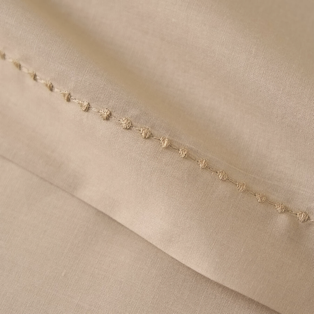 Fabric Detail of Yves Delorme Batiste Bedding in Biscuit