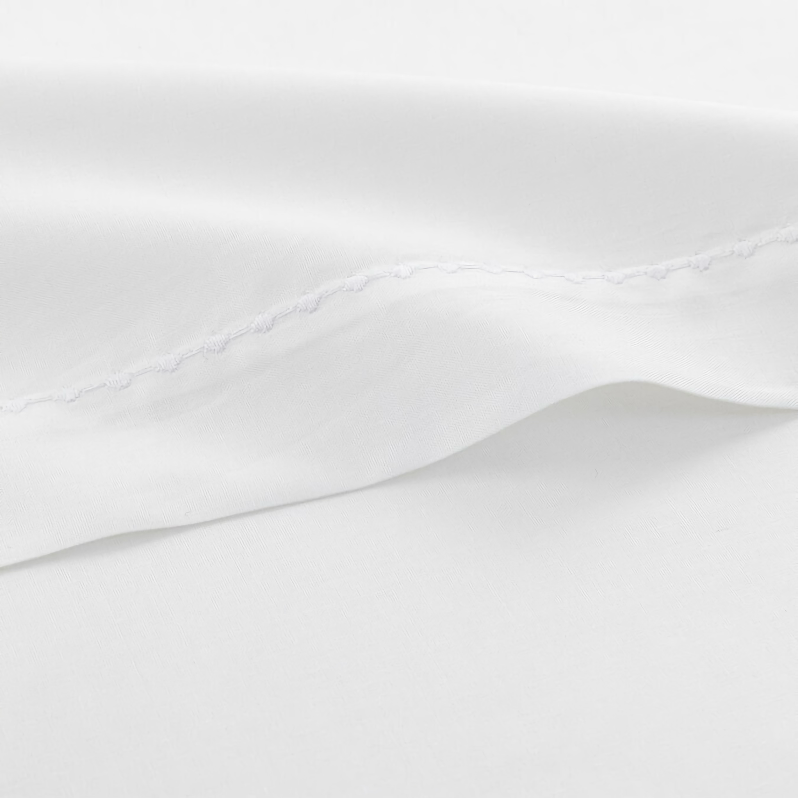 Bed in Complete Yves Delorme Batiste Bedding in Blanc Color