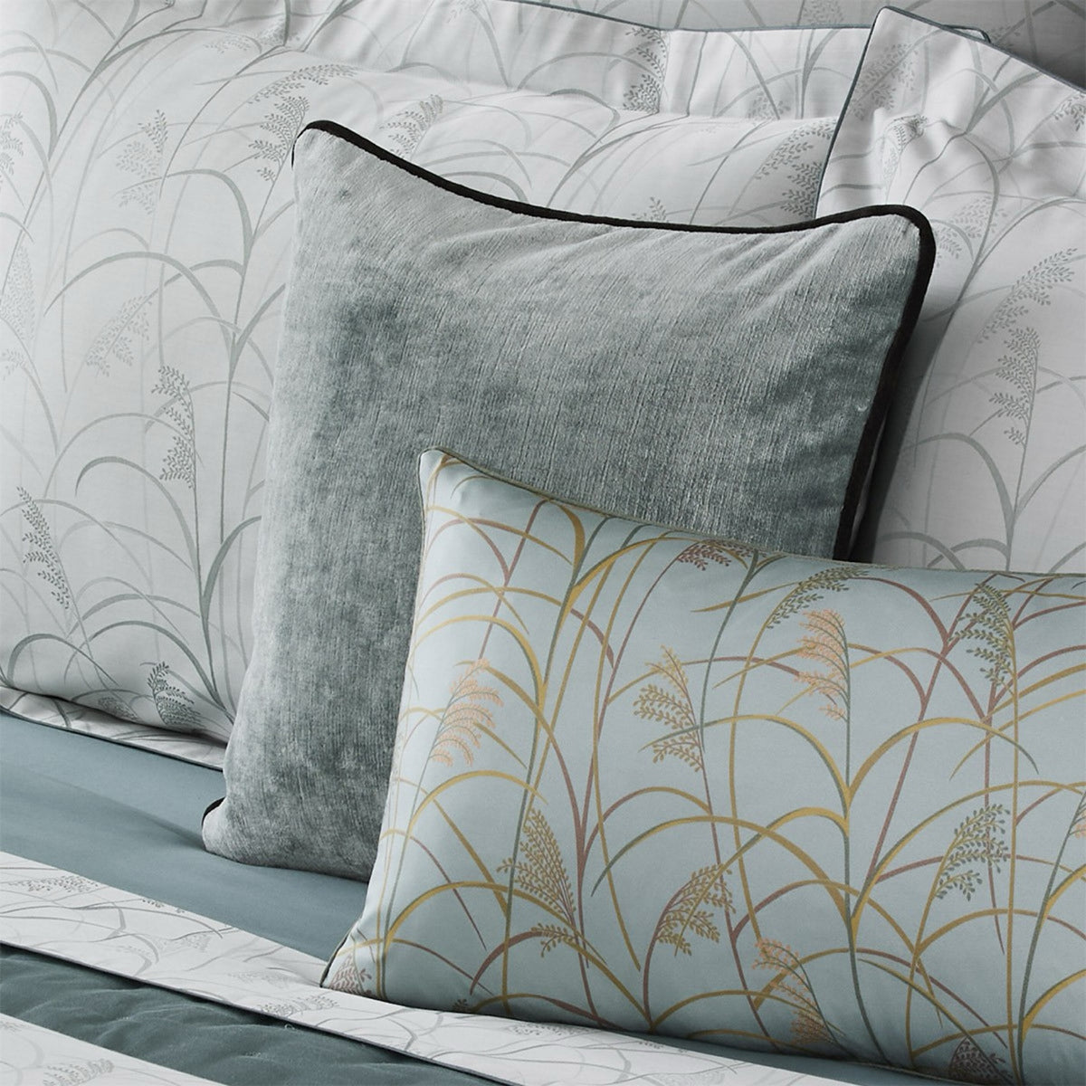 Yves Delorme Boromee Decorative Pillow in Fjord color with coordinate bedding