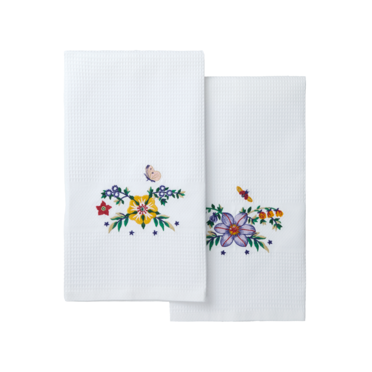 Pair of Yves Delorme Botanic Fingertip Towels with different embroidery designs