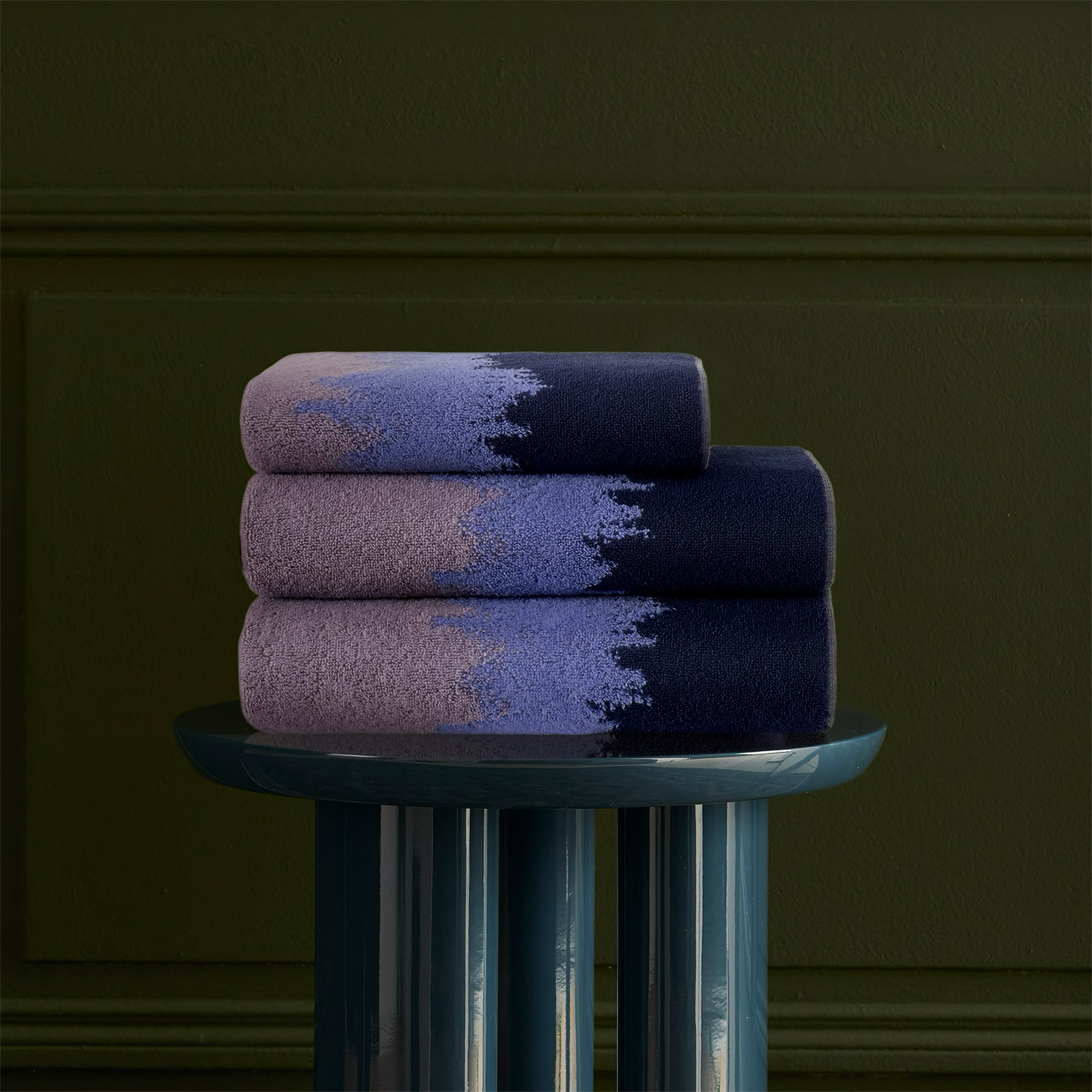 Yves Delorme Brume Bath Towels on pedestal 