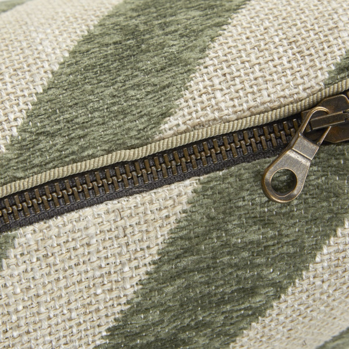 Zipper closeup of Yves Delorme Calisson Decorative Pillows in Amande color