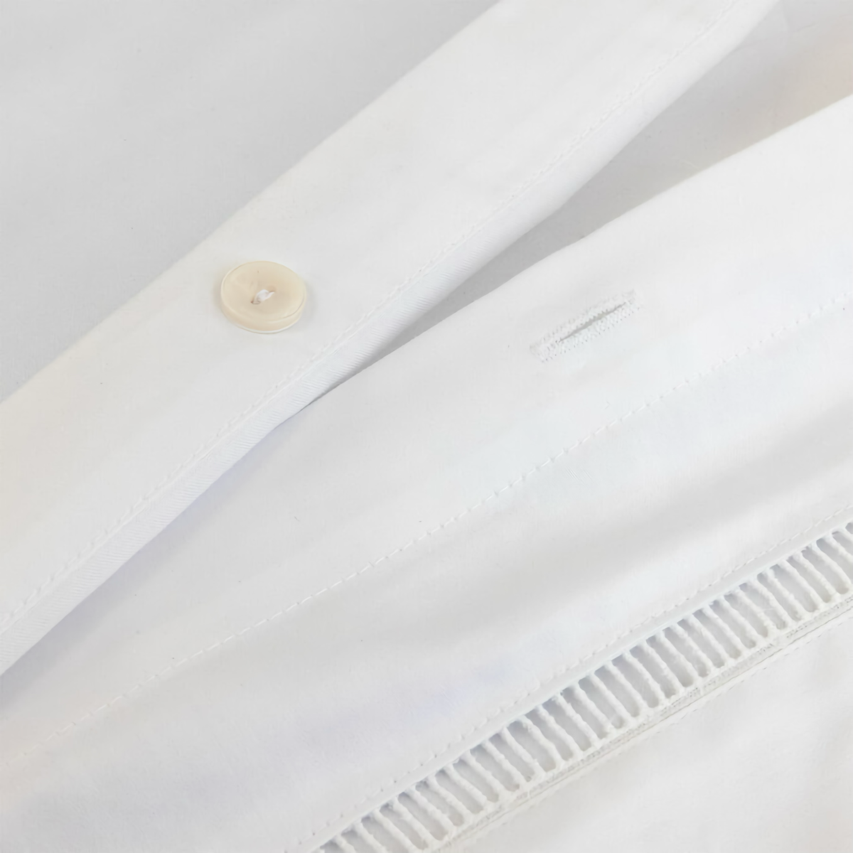 Button Closure of Yves Delorme Colisee Bedding