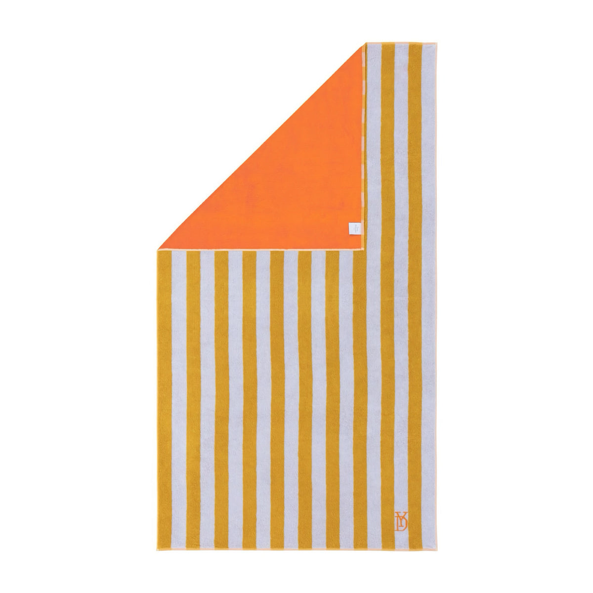 A rectangular Corail beach towel with yellow and white stripes on one side, solid orange on the other. Made in France.
