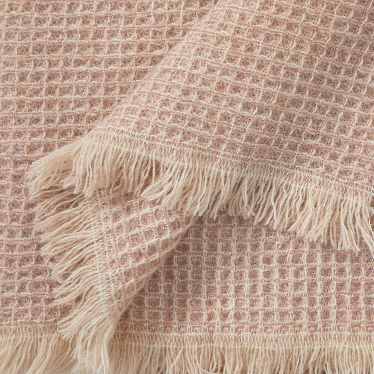 Close Up Shot of Yves Delorme Cosy Throw in Poudre Color