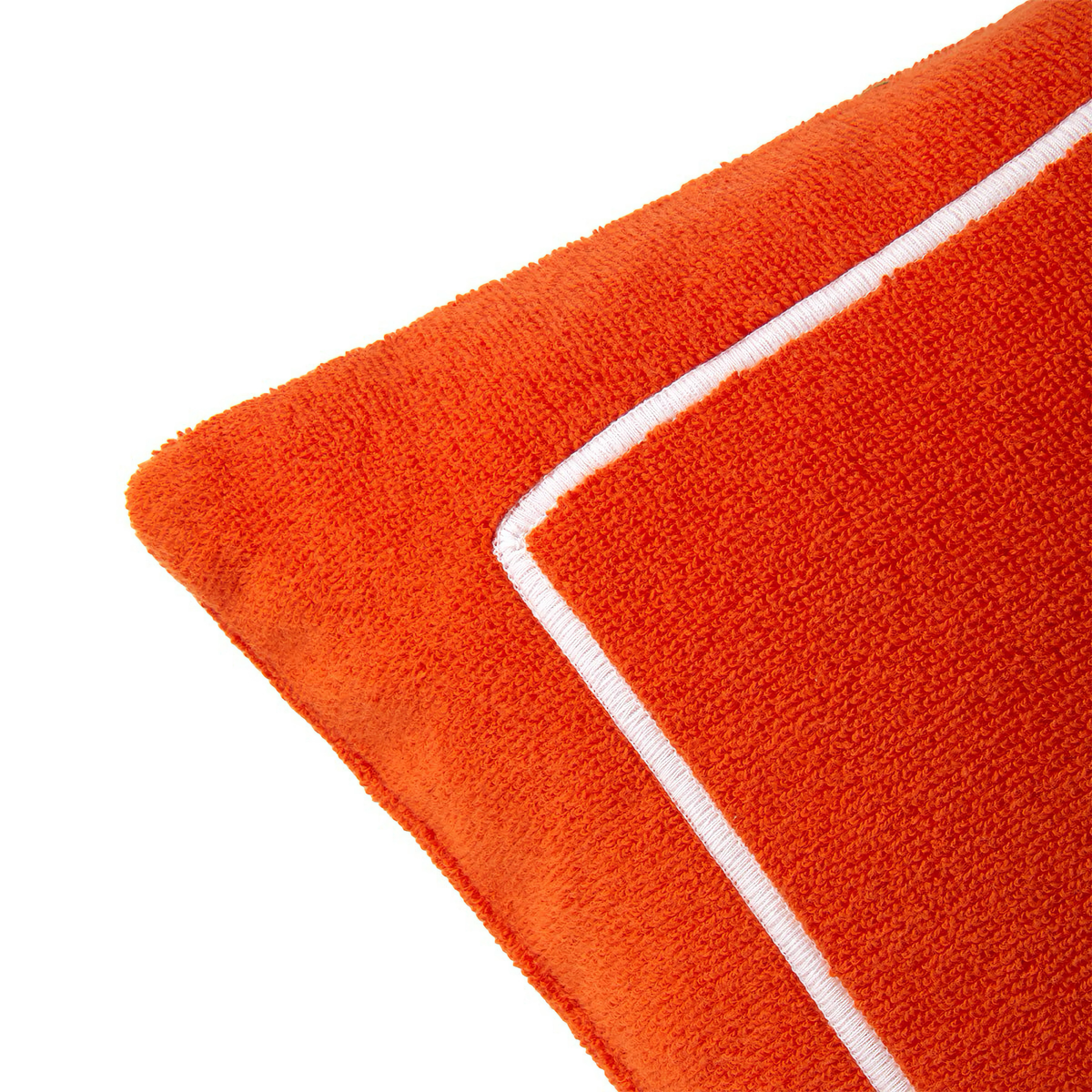 Corner of Yves Delorme Croisiere Beach Pillow in Oranger