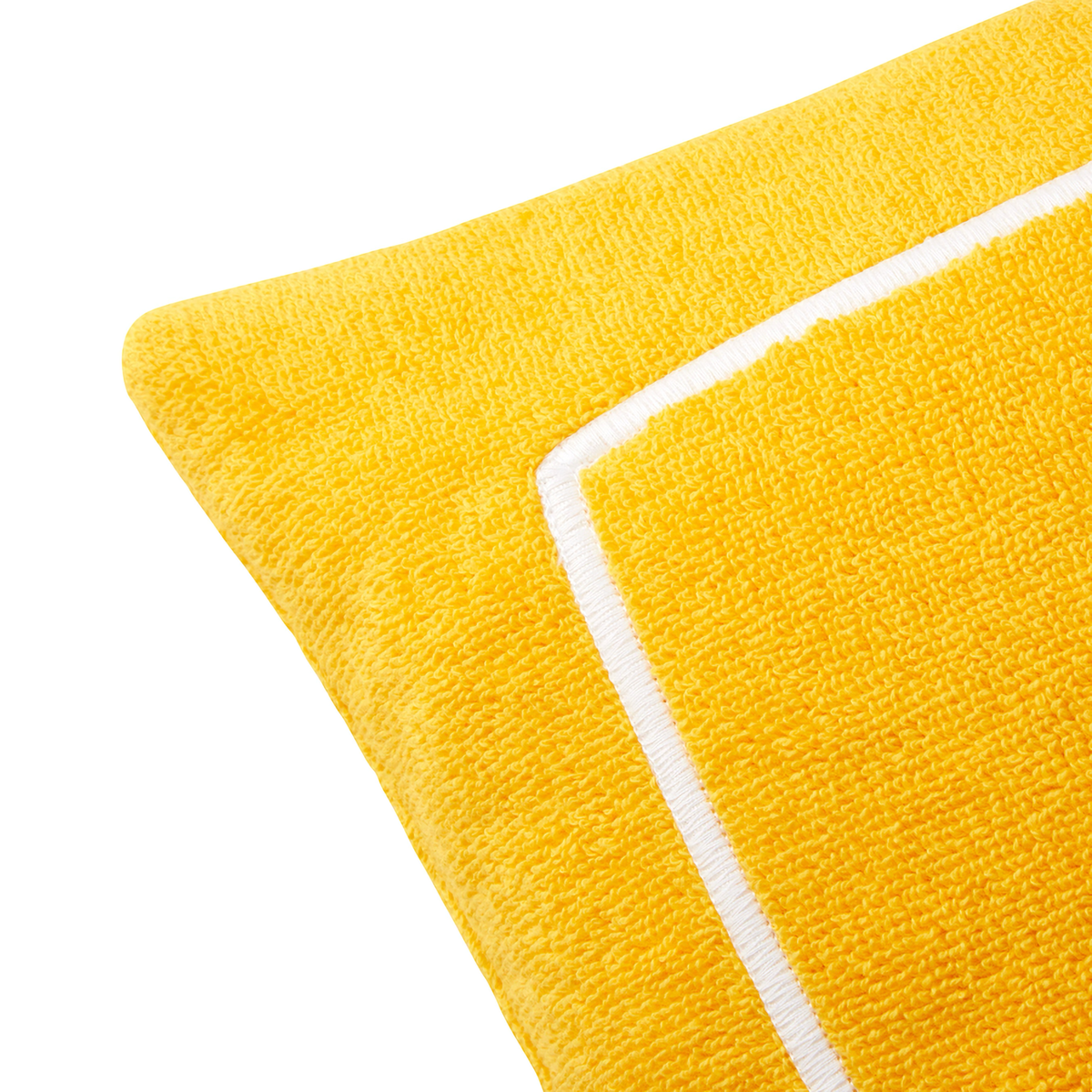 Corner of Yves Delorme Croisiere Beach Pillow in Riviera