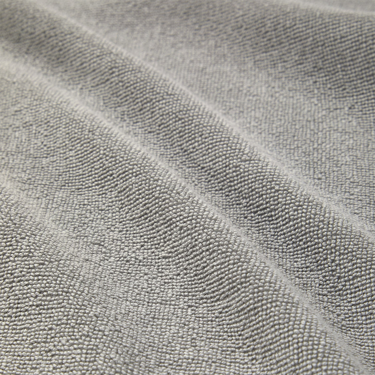 Detail of Yves Delorme Croisiere Beach Towels Platine