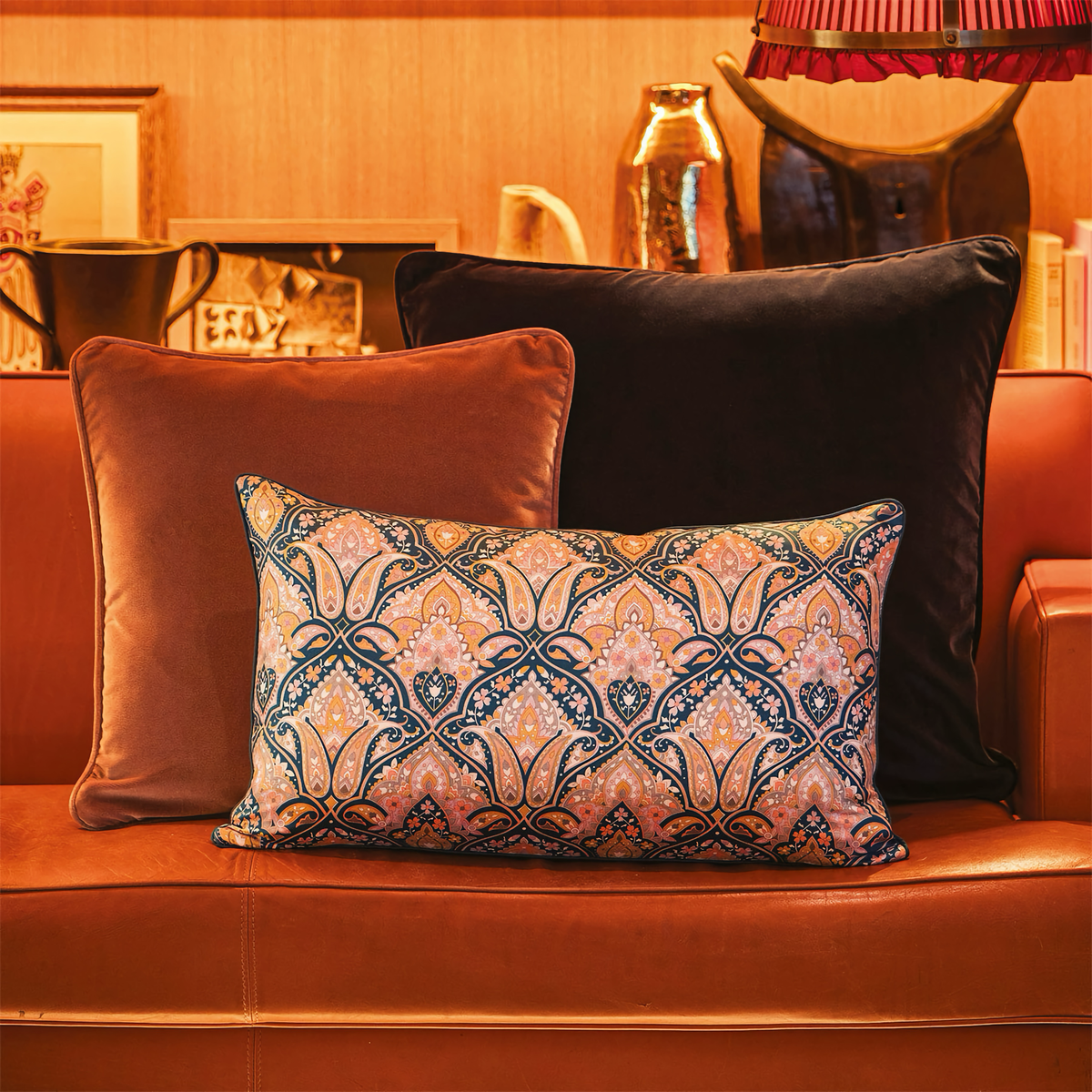 Yves Delorme Dandy Decorative Pillow on a Couch with Coordinate Shams