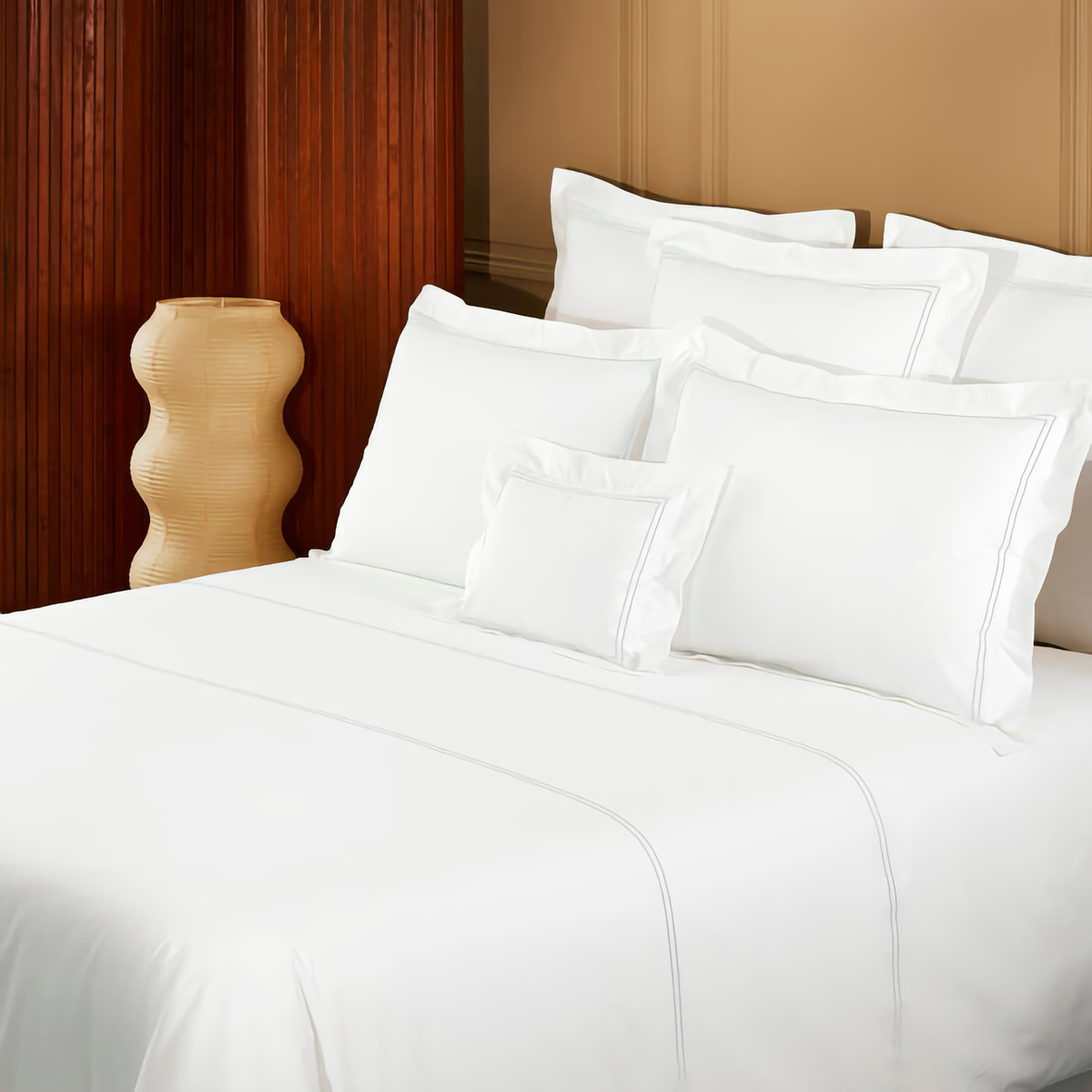 Closeup of Yves Delorme Duo Bedding in Blanc