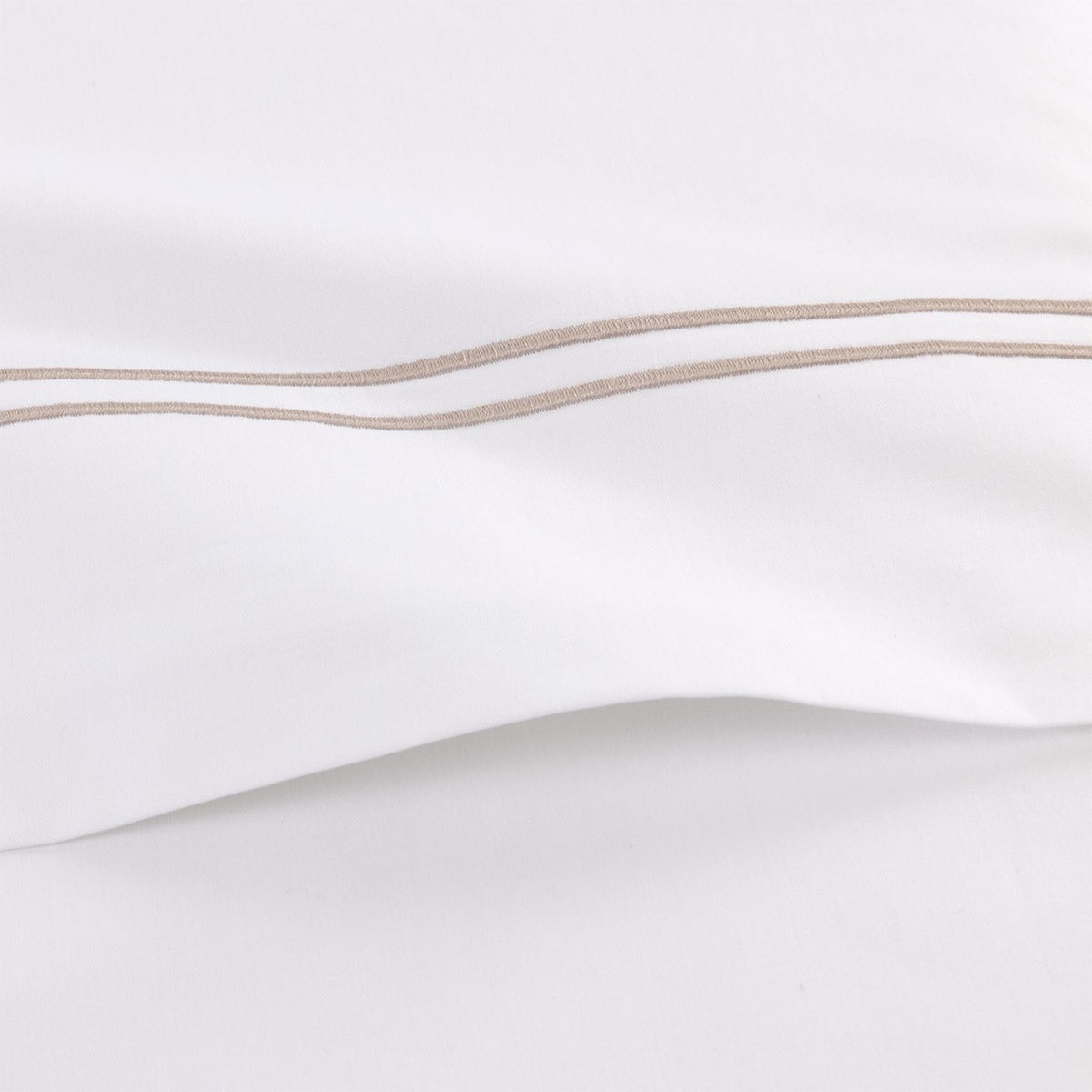 Fabric Closeup of Yves Delorme Duo Bedding and Loutre lining