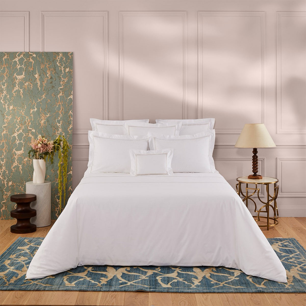 Bed with Yves Delorme Duo Bedding and Loutre lining