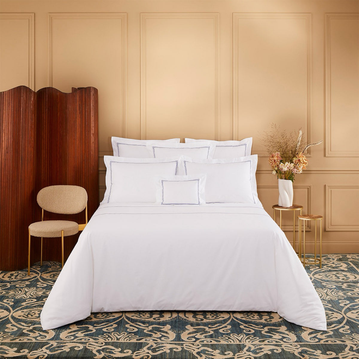 Bed with Yves Delorme Duo Bedding and Outremer lining