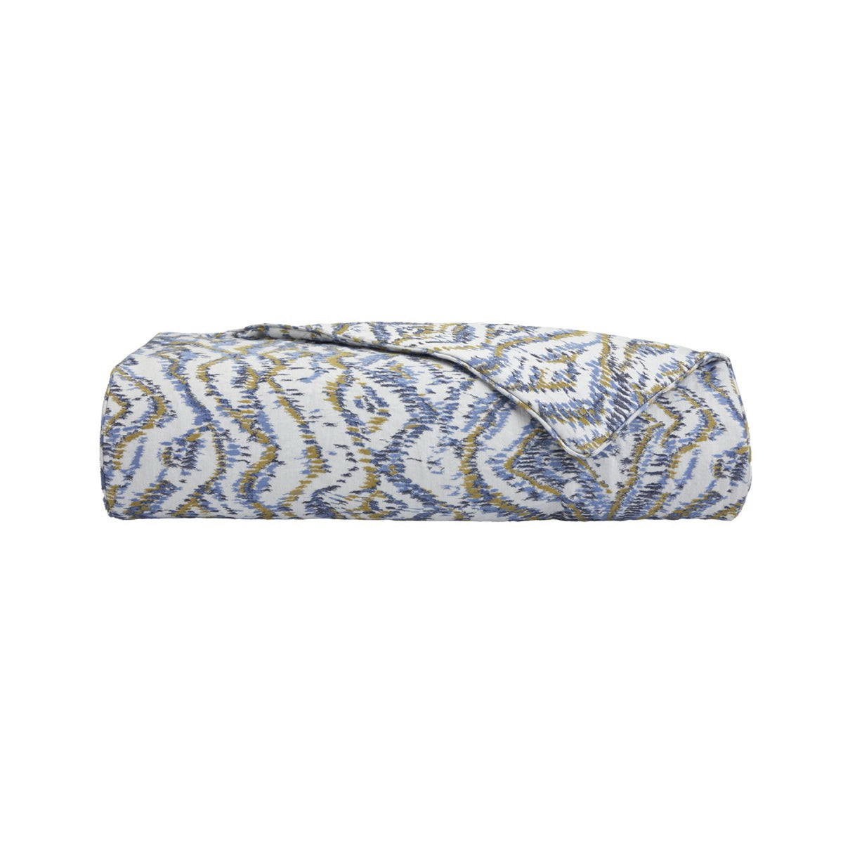 A folded bed rubber of Yves Delorme Ecumes Bedding against a white background.