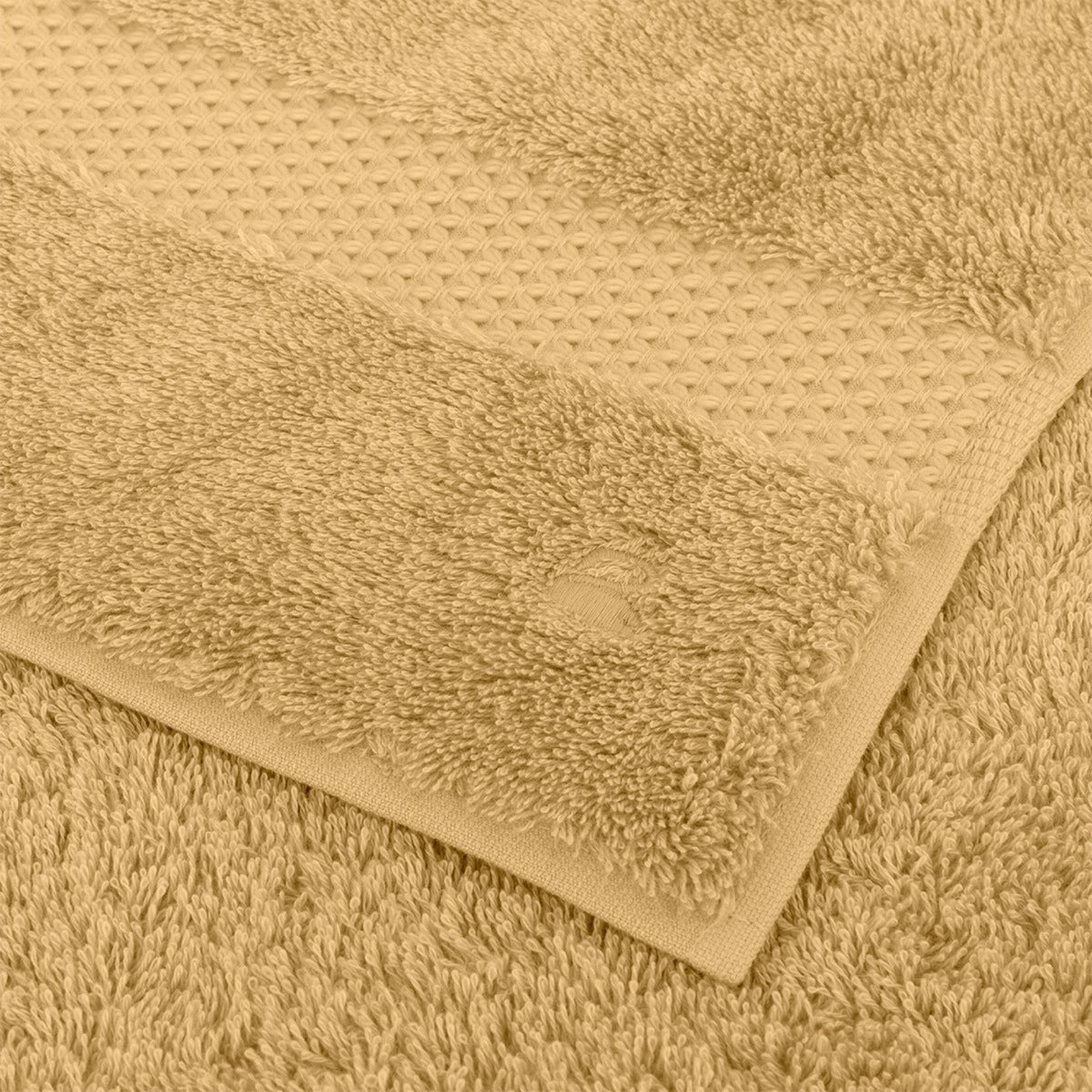 Fabric Closeup of Yves Delorme Etoile Bath Towels in Pollen color