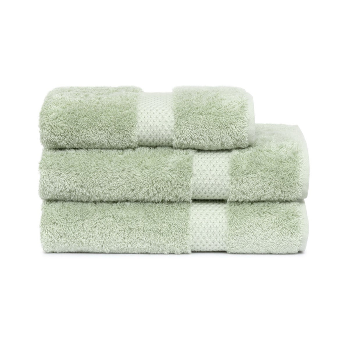 Stack of Folded Yves Delorme Etoile Bath Towels in Amande