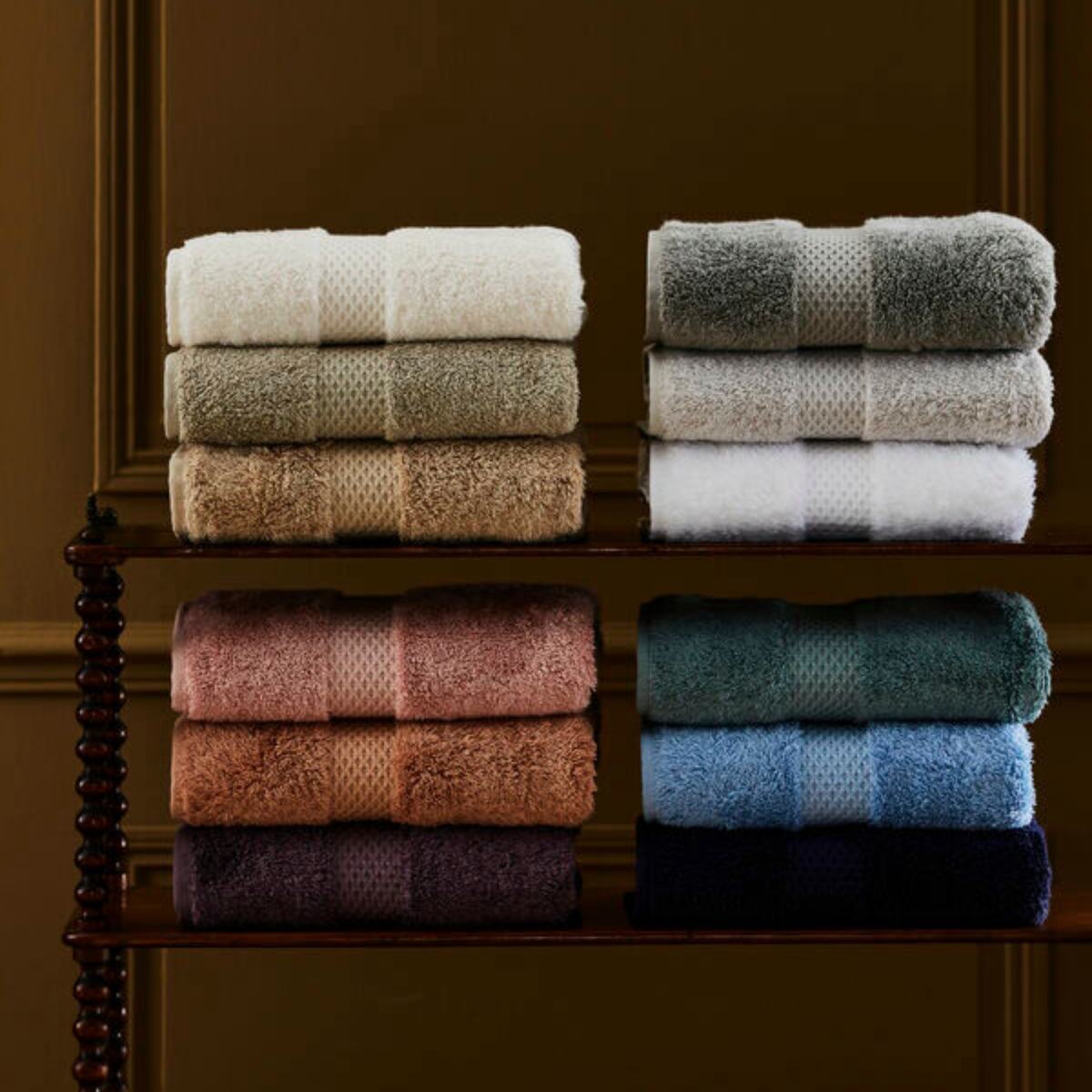 Stack of Yves Delorme Etoile Bath Towels Showing All Colors