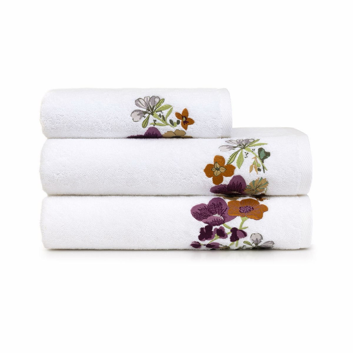 Stack of three folded Yves Delorme Fleurs Bath Towels