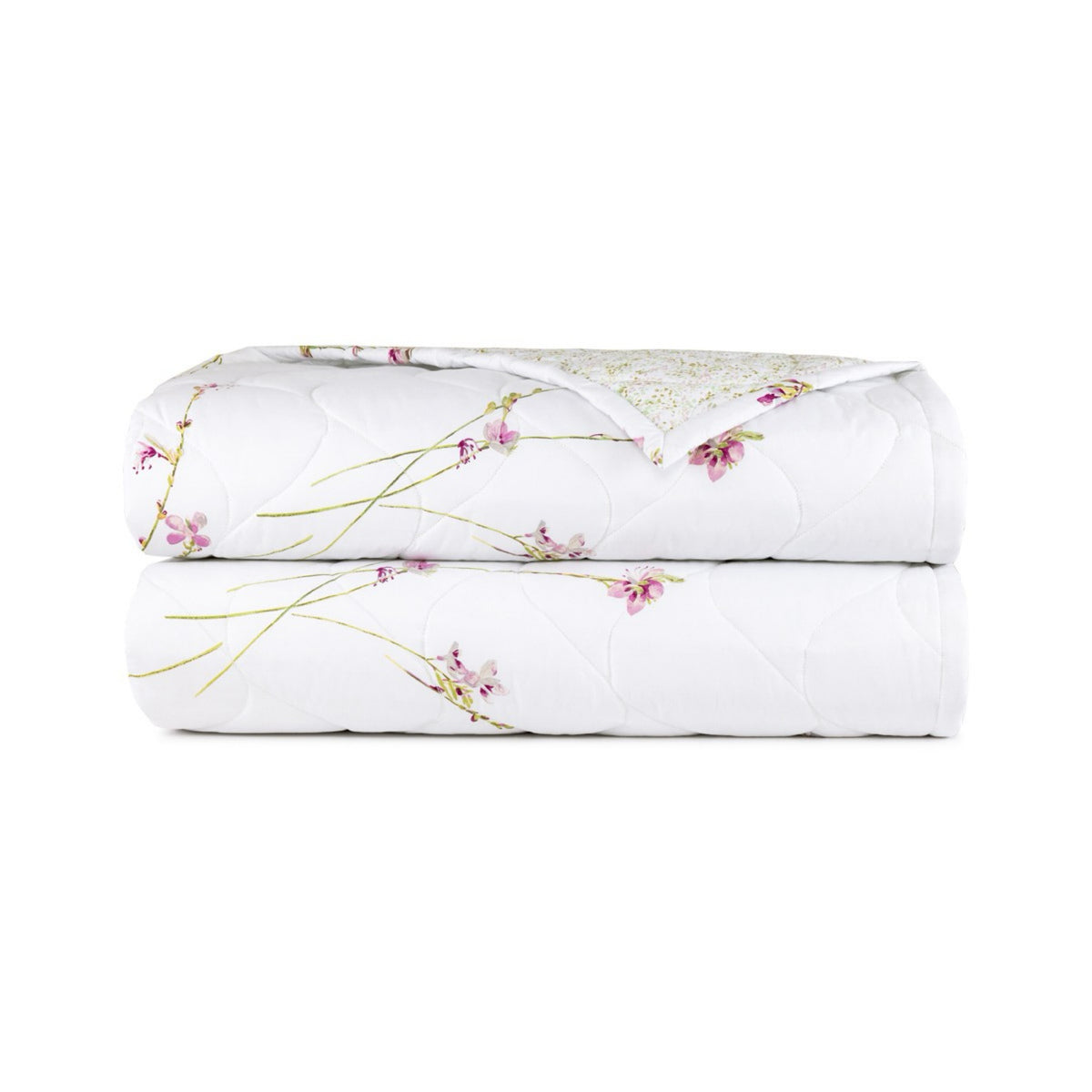 A folded Coverlet of Yves Delorme Gaura Bedding Collection