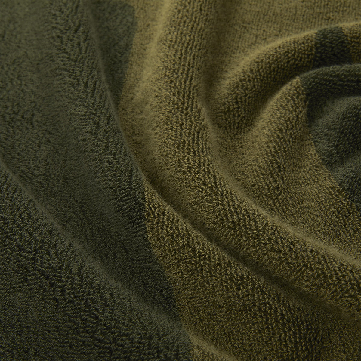 Close Up Image of Yves Delorme Griffe Beach Towel in Color Kaki