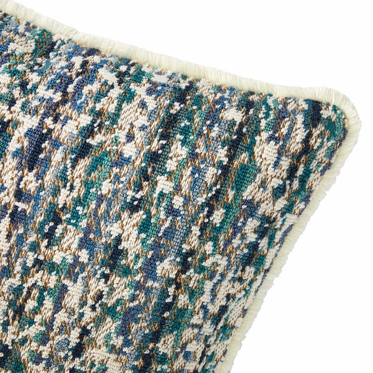 Corner Detail of Yves Delorme Illusion decorative pillows in Paon