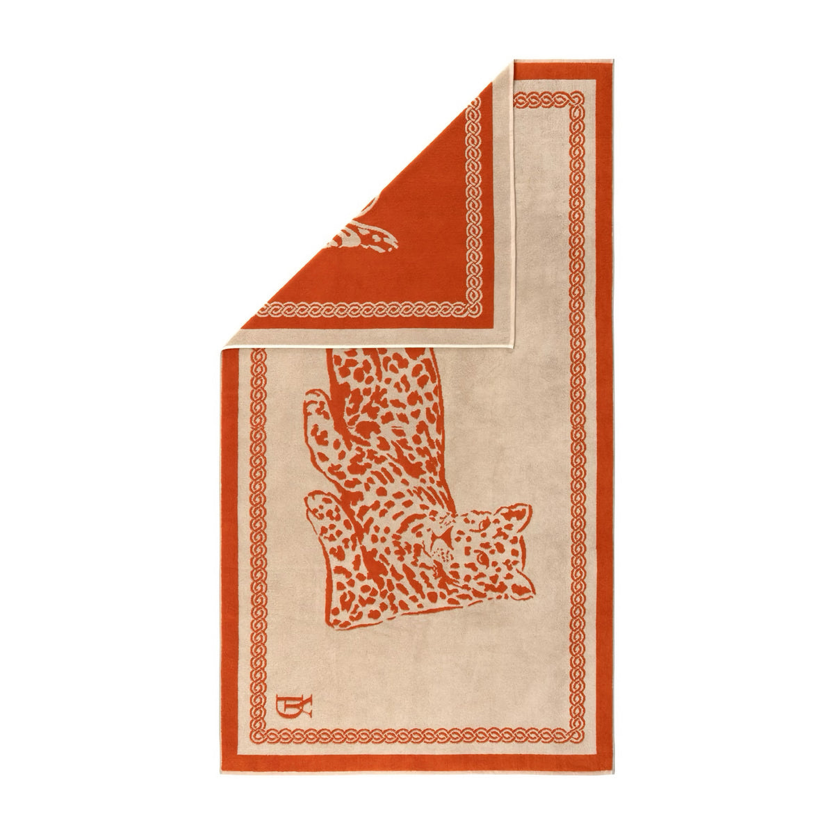 Rectangular Yves Delorme Leopard Beach Towel with an orange border, a leopard illustration, and one corner folded