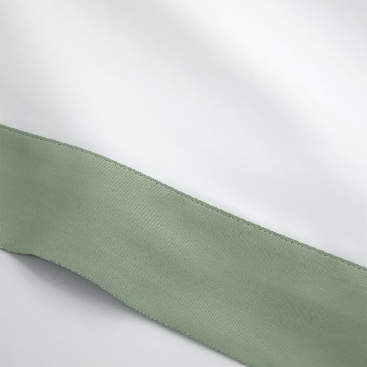 Fabric Closeup of Yves Delorme Linea Bedding in Veronese