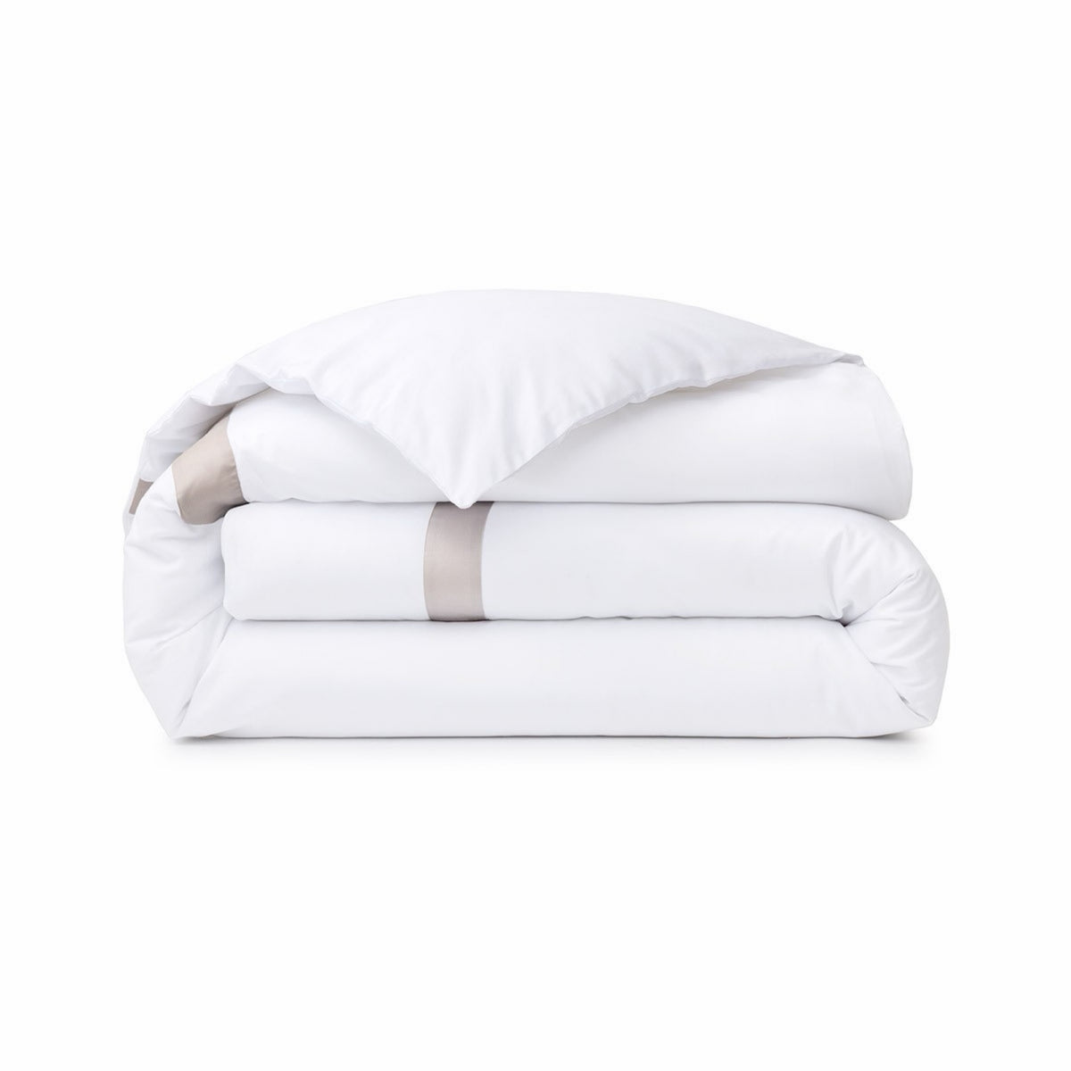Folded Yves Delorme Linéa Duvet Cover, accented by a Loutre color border