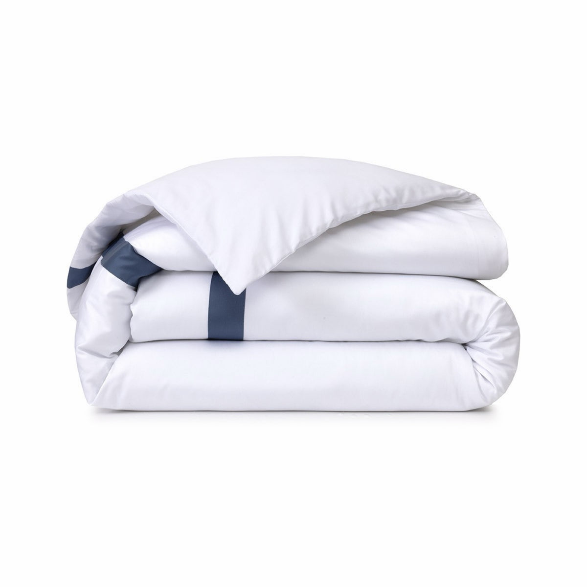 Folded Yves Delorme Linéa Duvet Cover, accented by a Outremer color border