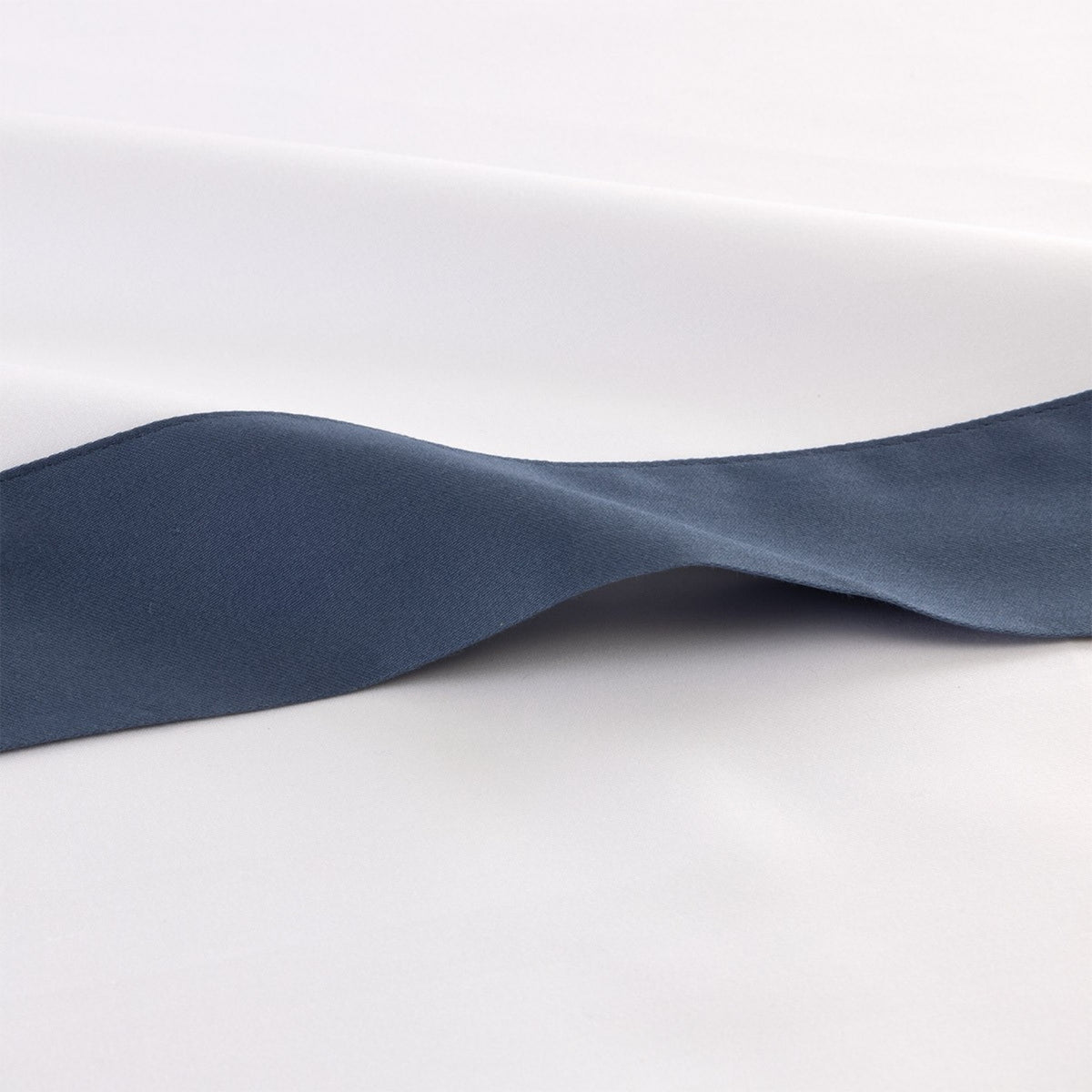 Fabric Closeup of Yves Delorme Linea Bedding in Outremer color