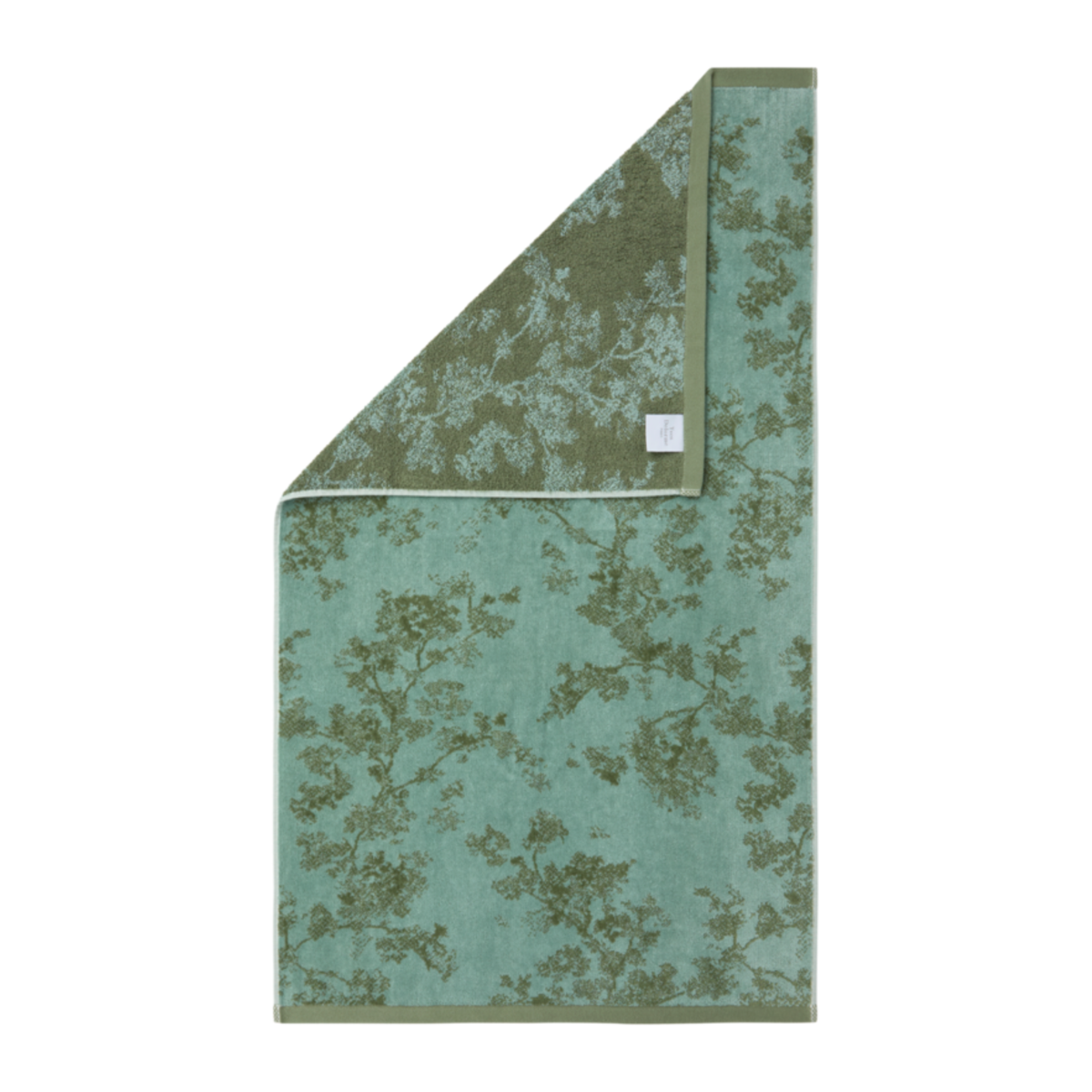 Yves Delorme Muses Bath Towel with a fold showing its reverse side