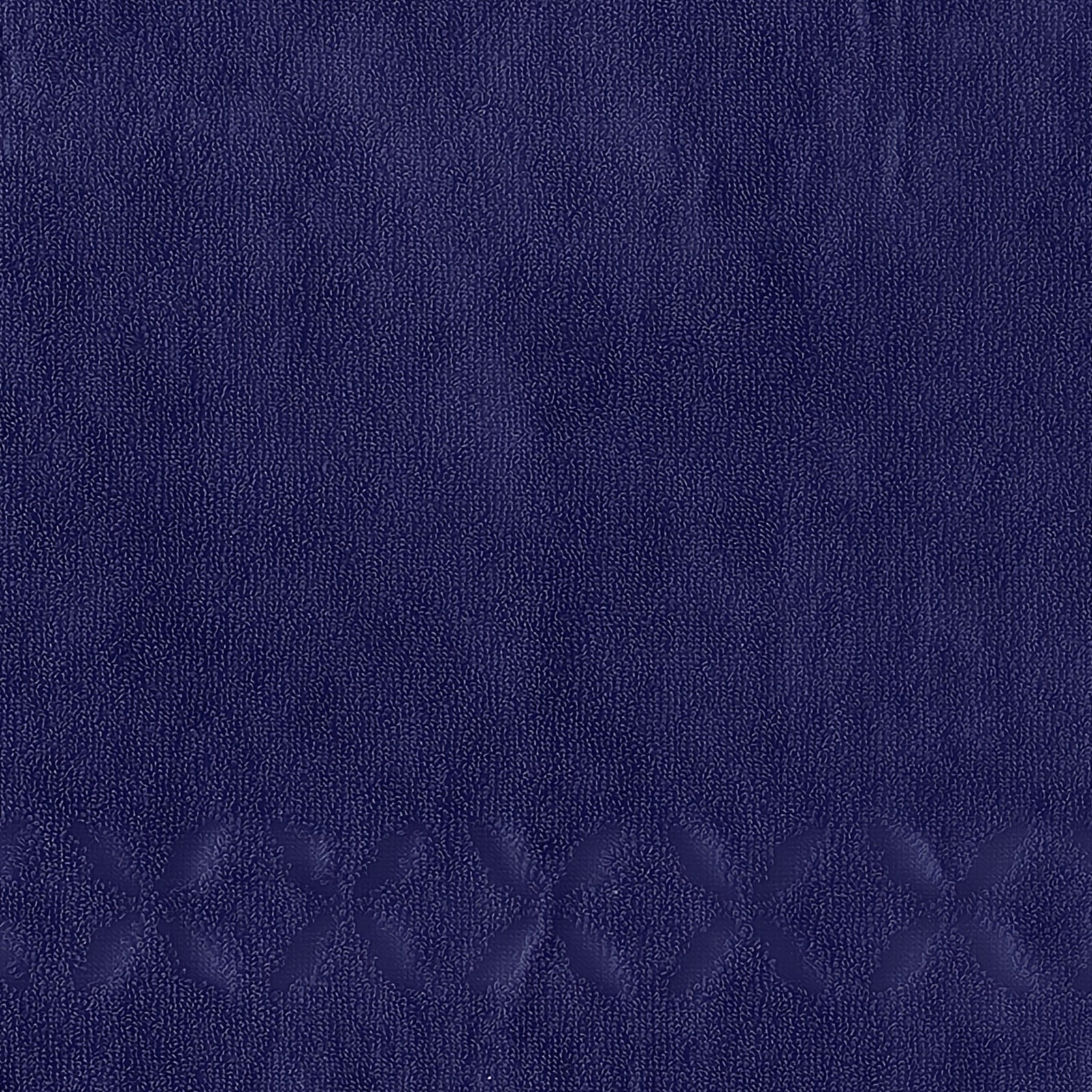 Folded Yves Delorme Nature Bath Towels in Encre color