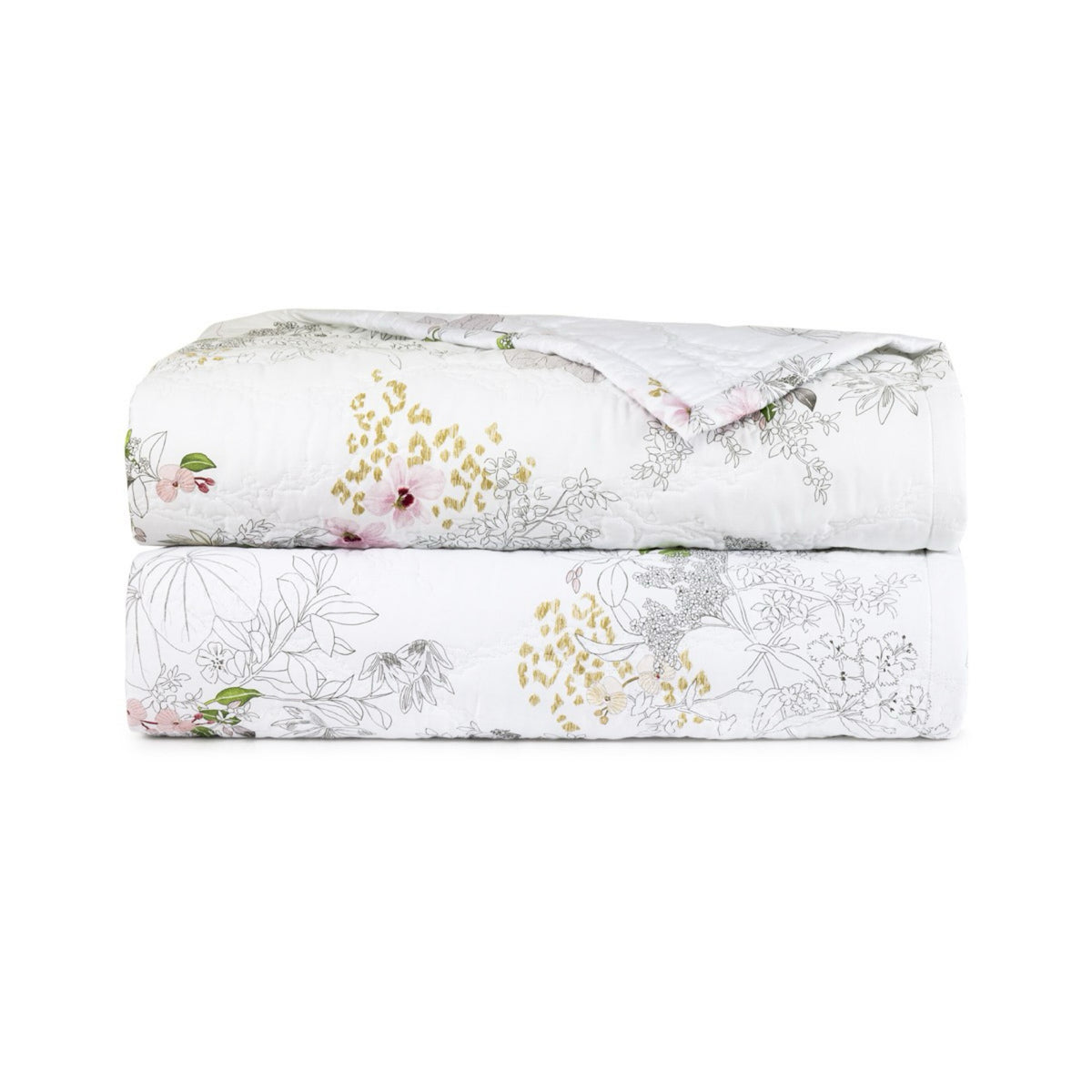A folded white Coverlet from the Yves Delorme Orchidée Bed Collection with a floral print on cotton satin bedding