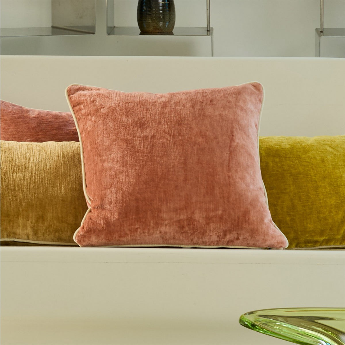 Yves Delorme Orpheo Decorative Pillows with color Santal at the center